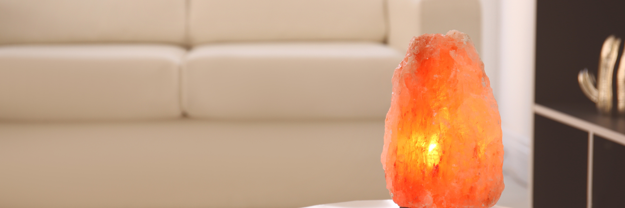 Handcrafted Himalayan salt lamp placed on a table for ambient lighting.