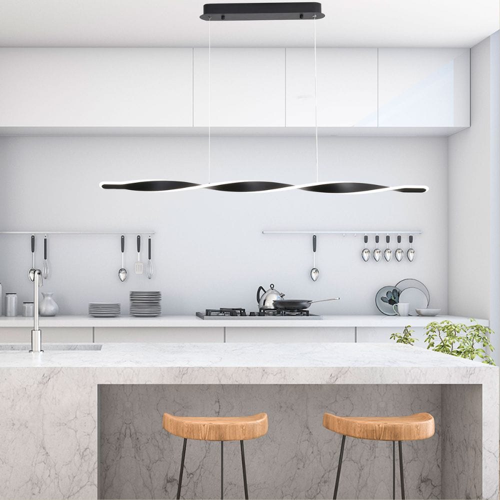 Tri-colour dimmable pendant light hanging over a modern dining table.