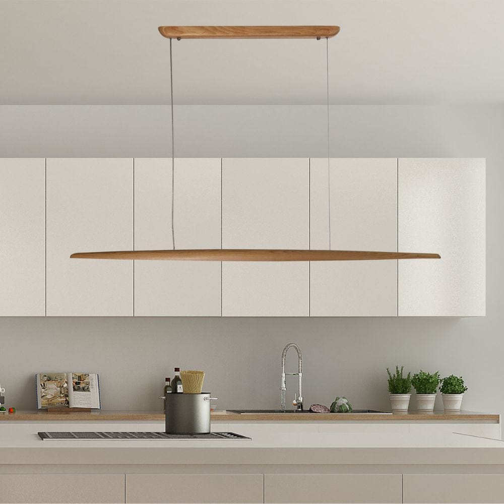 Modern linear ash wood pendant light suspended above a dining area.